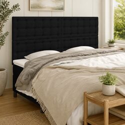 Enhance Your Space with This Black Fabric Headboard
