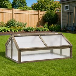 Your Friendly Grey Wooden Greenhouse for Plant Care