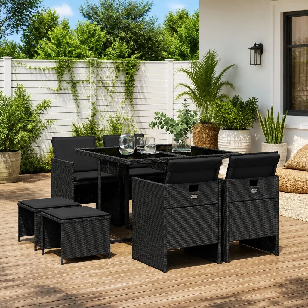 9 Piece Black Poly Rattan Patio Furniture Set with Foldable Chairs and Tempered Glass Table for Outdoor Dining and Relaxation