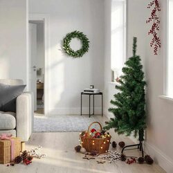 Enjoy a Cozy Space with This Green Half Christmas Tree