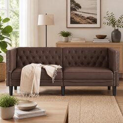Relax on the 2-Seater Chesterfield Sofa in Brown Faux Leather