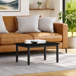 Create a Welcoming Space with This Black Coffee Table