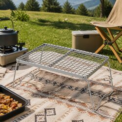 Enjoy Cooking Outdoors with This Convenient Portable Grill