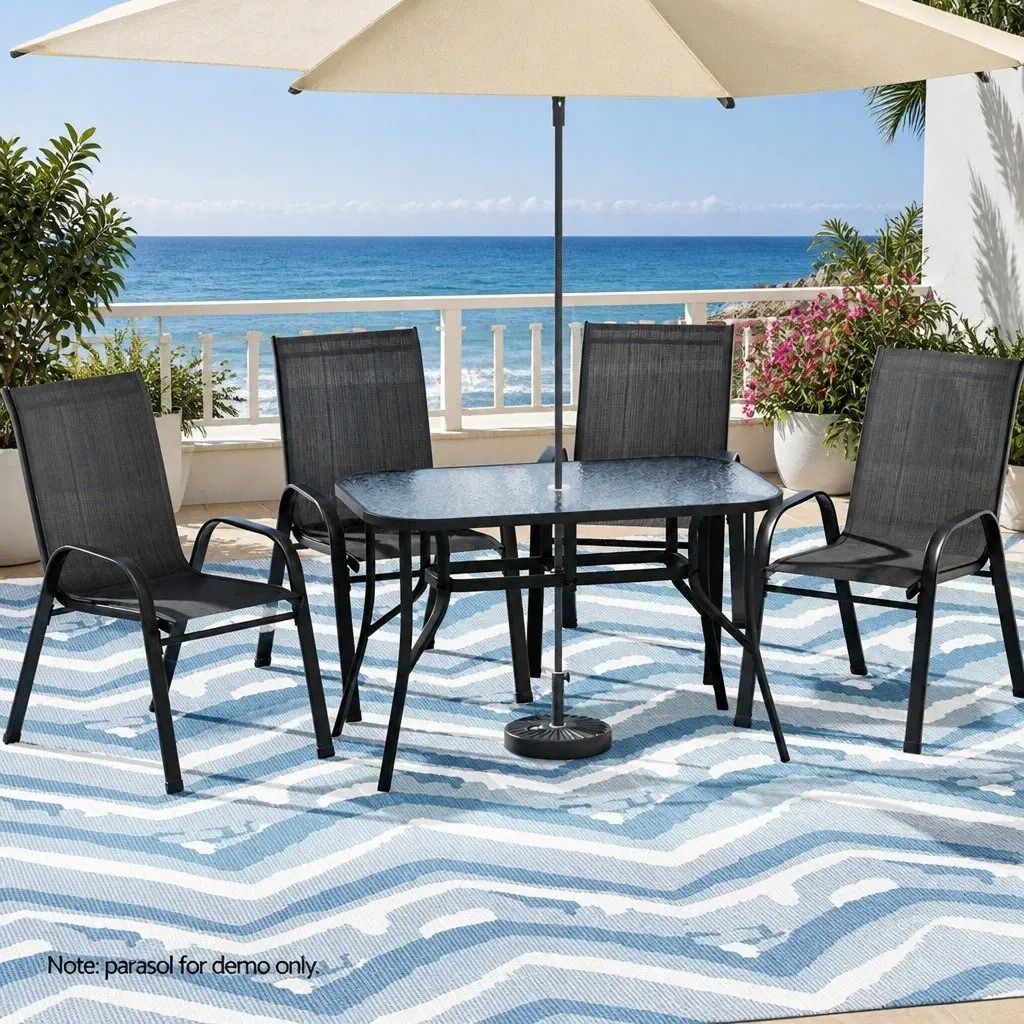 5 Piece Outdoor Dining Set Black Steel Frame Glass Table Stackable Chairs