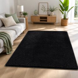 Experience Comfort with the Black Plush Rug 140x200cm